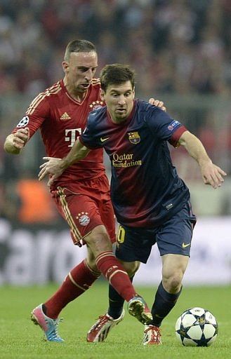 Bayern Munich's Franck Ribery (L) and Barcelona's Lionel Messi fight for the ball on April 23, 2013 in Munich